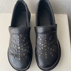 Born leather clogs with brass studs. Size 8.5